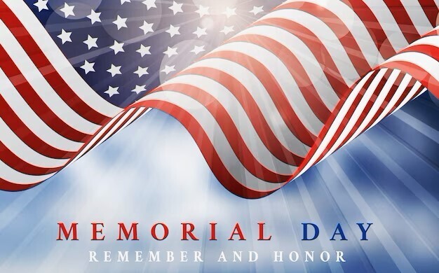 An American Flag displaying the words Memorial Day