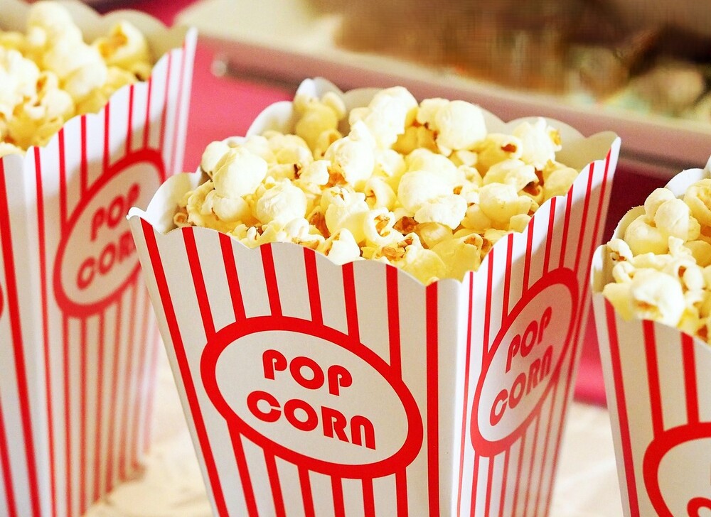 Red and white bags filled with popcorn